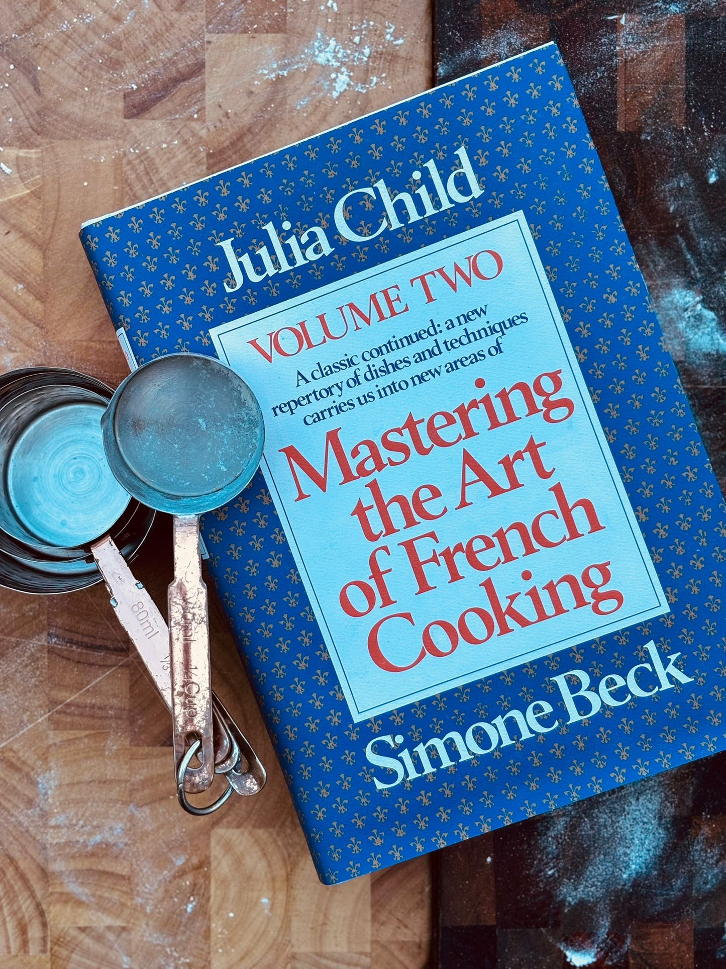 Julia Childs in three Harcover Books: The French Chef Cookbook, Mastering the Art Of Frecnh Cooking Volumes One and Two. Three Beautiful Enormous Books!