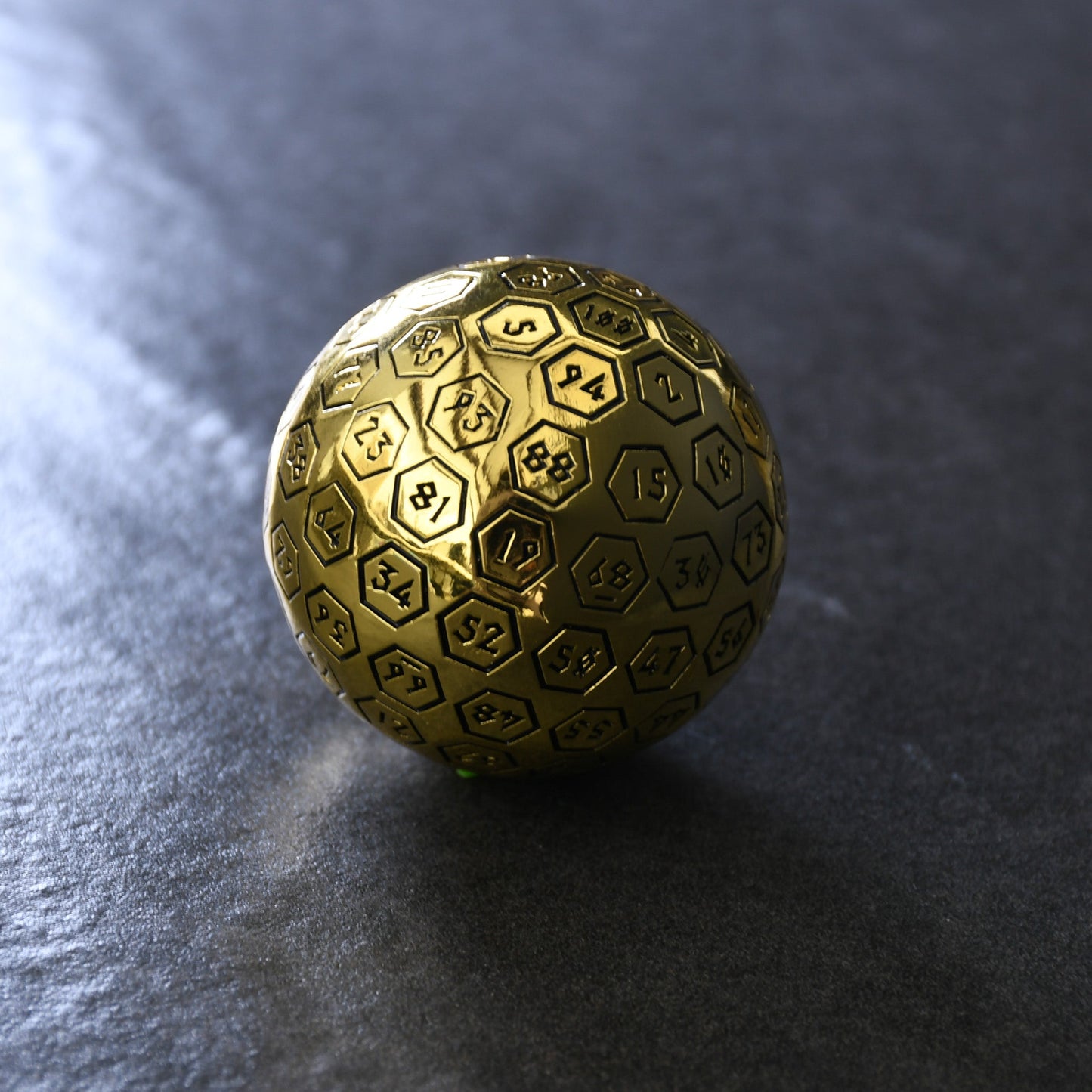The Orb D100 - Black and Gold Metal Die