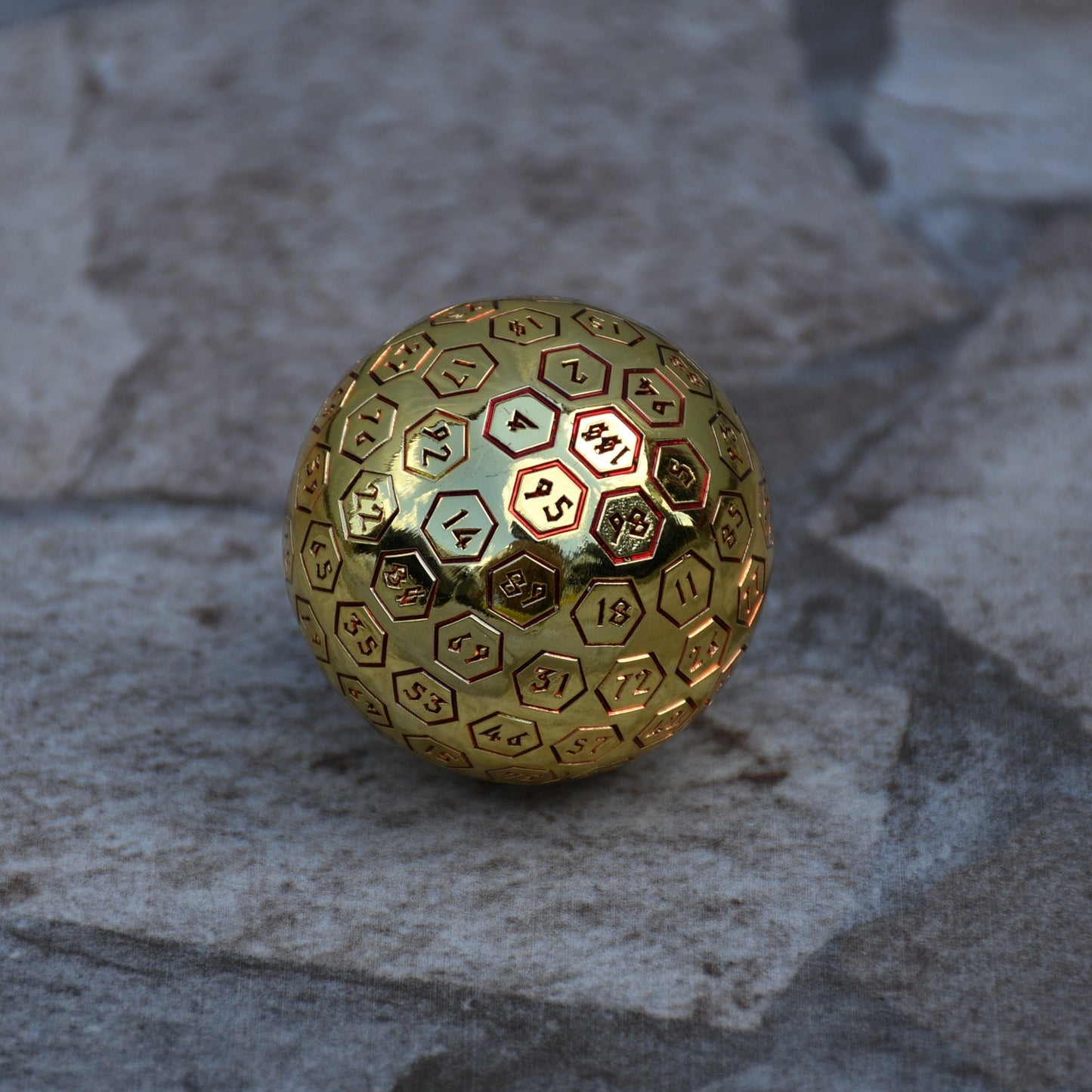 The Orb D100 - Red and Gold Metal Die