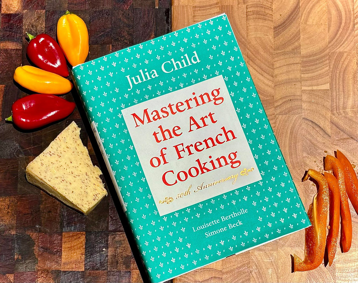 Julia Childs in three Harcover Books: The French Chef Cookbook, Mastering the Art Of Frecnh Cooking Volumes One and Two. Three Beautiful Enormous Books!