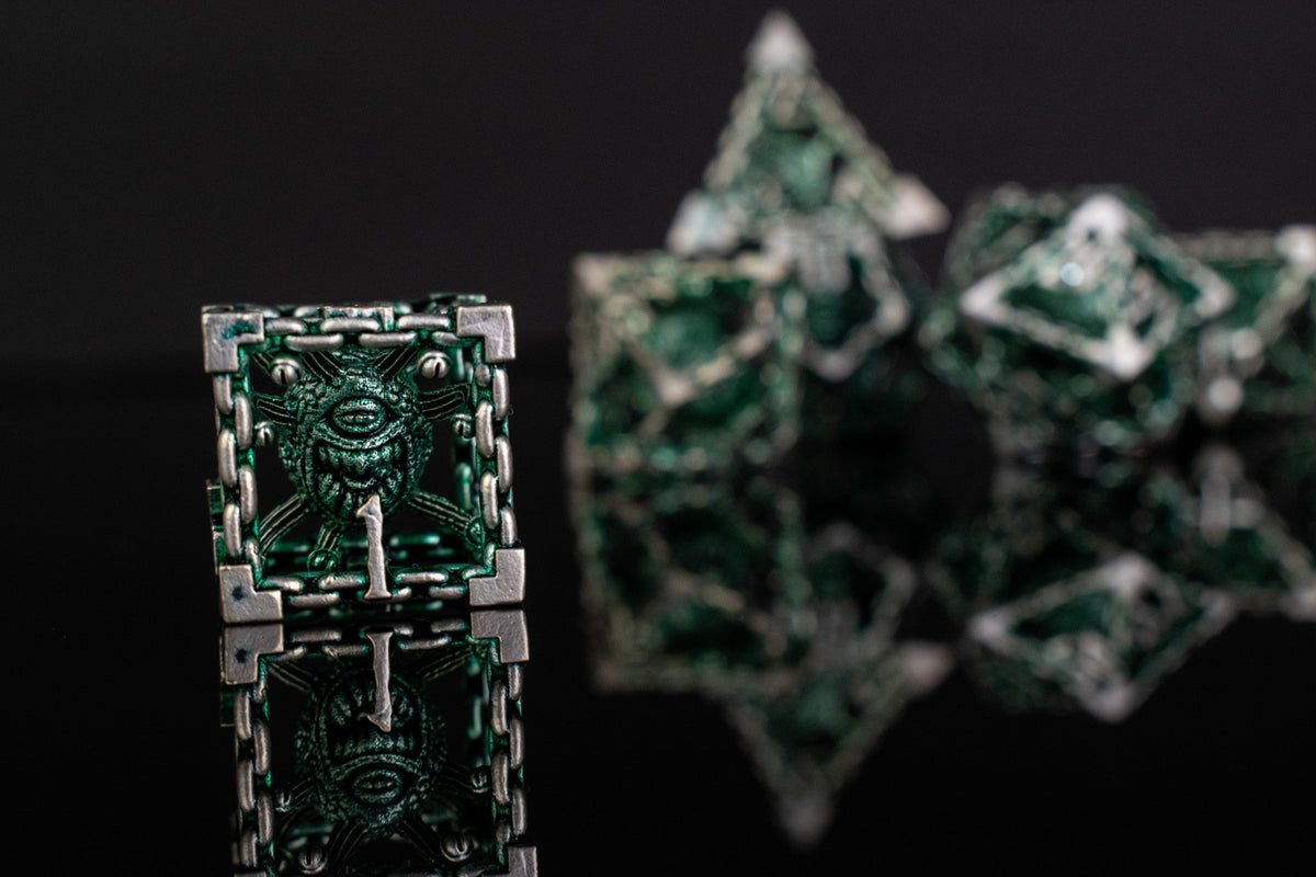 Pre-Order|| Beholder's Gates Hollow Metal Dice Set - Green and Silver