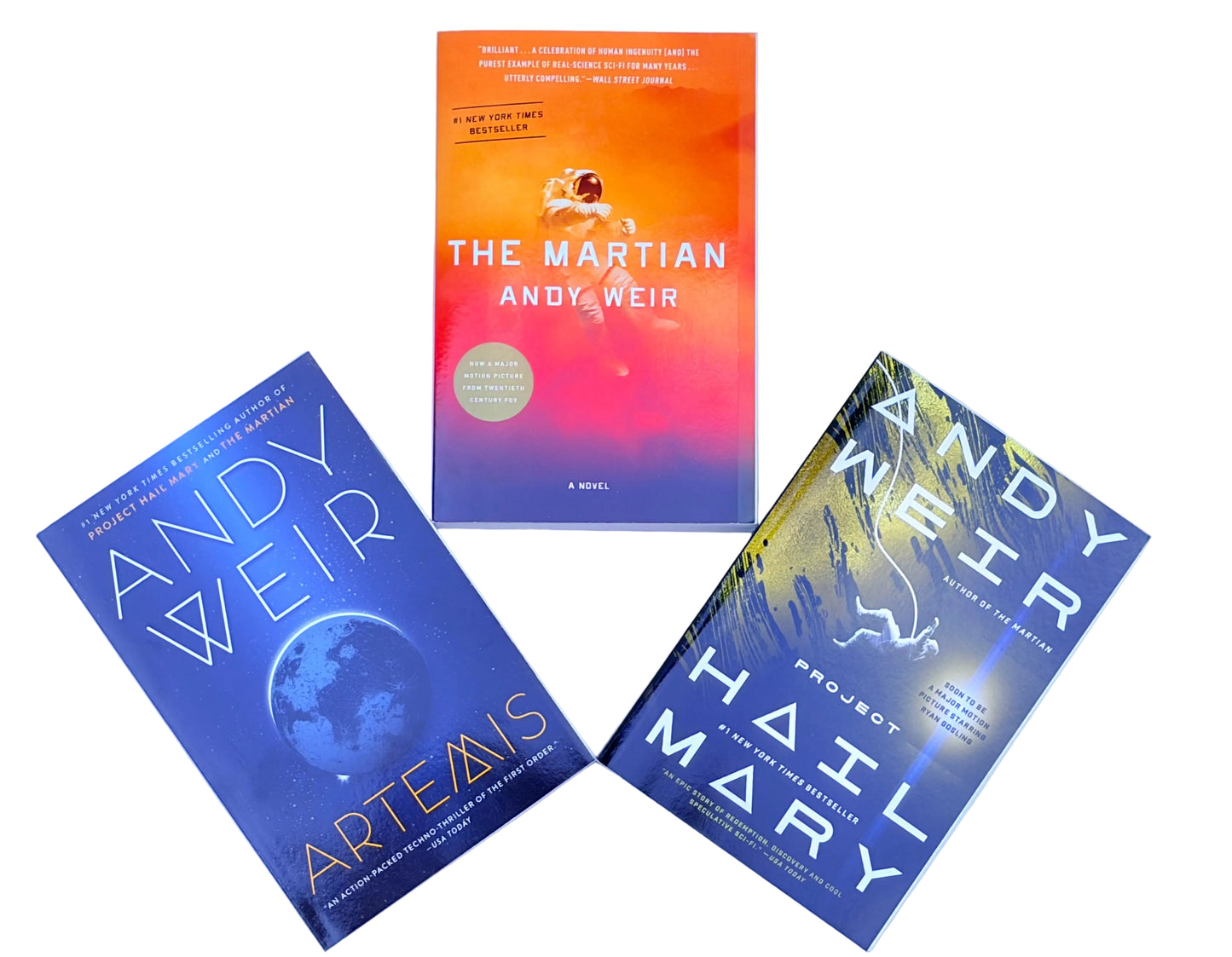 Three books by Andy Weir arranged on a white background: 'Artemis' in blue, 'The Martian' in orange-red gradient, and 'Project Hail Mary' in dark blue with gold and white text.