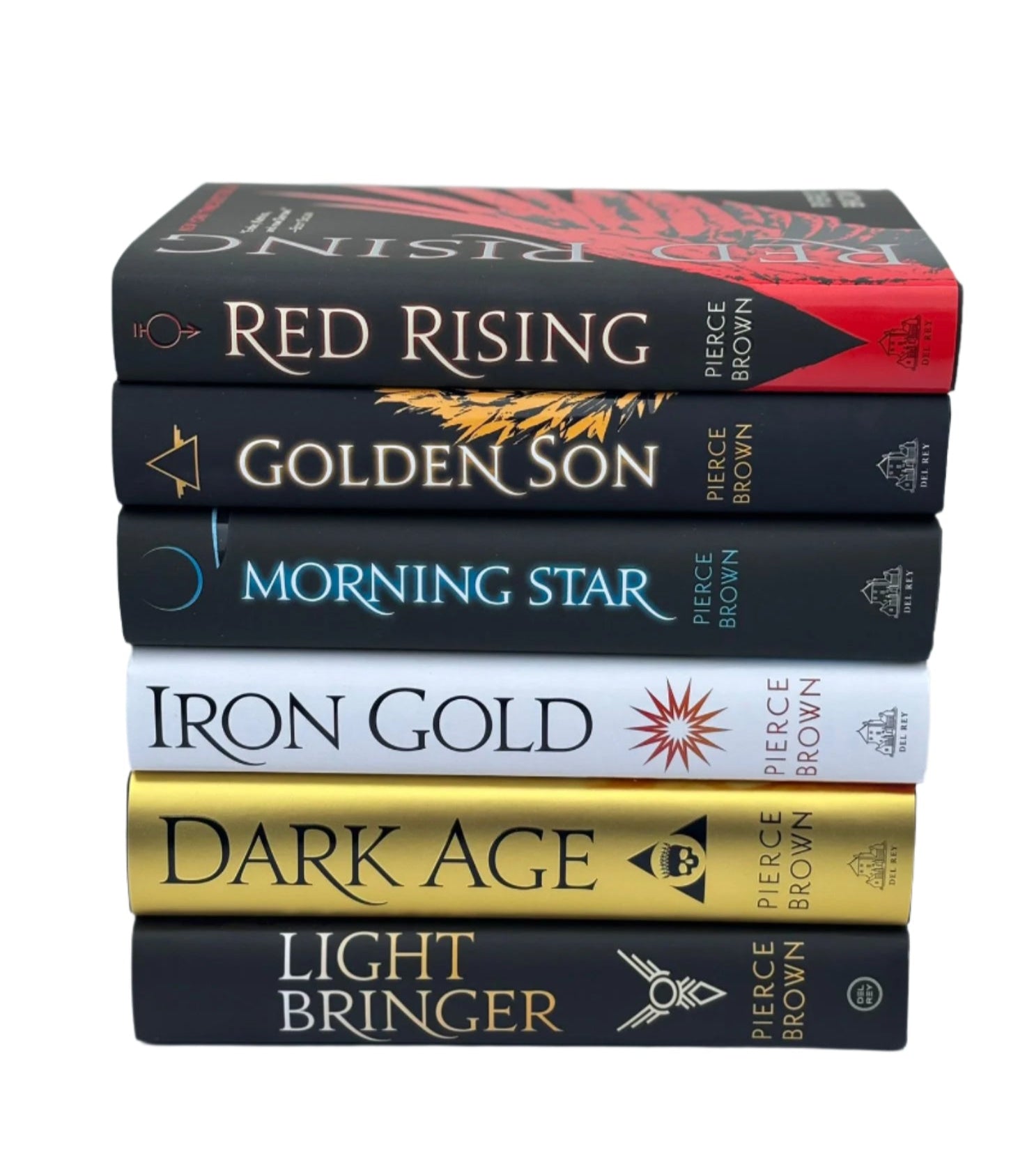 Stack of books titled 'Red Rising', 'Golden Son', 'Morning Star', 'Iron Gold', 'Dark Age', and 'Light Bringer' by Pierce Brown on a light gray background.