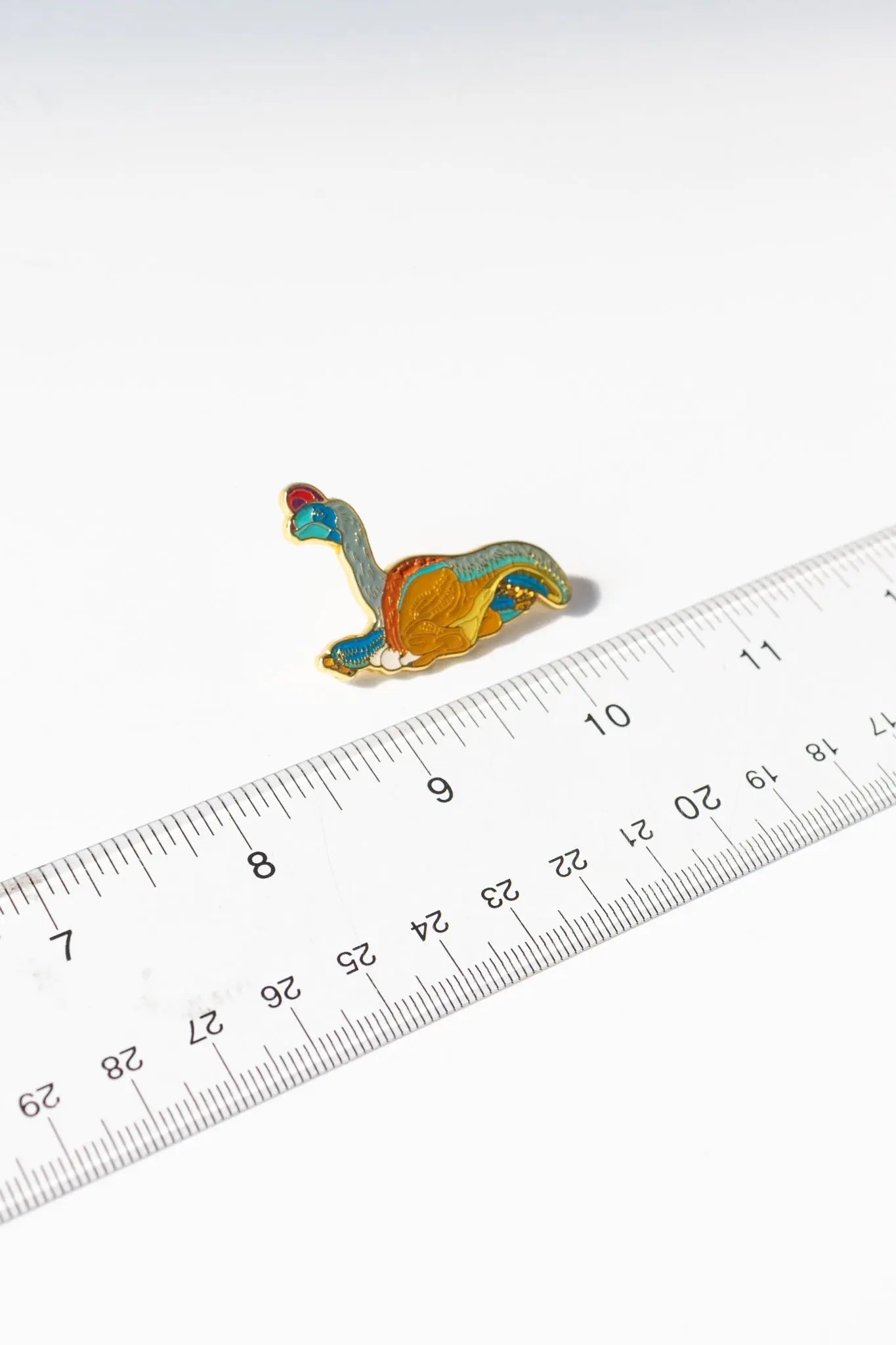 Oviraptor Enamel Pin (Oviraptor philoceratops)